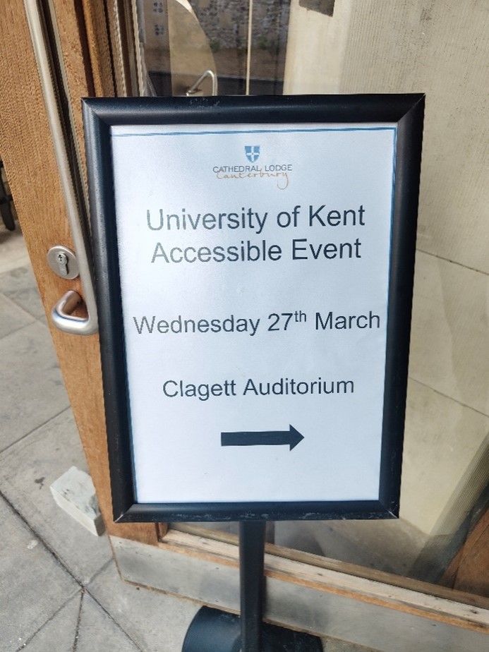 colour photo of the door sign for the accessible event